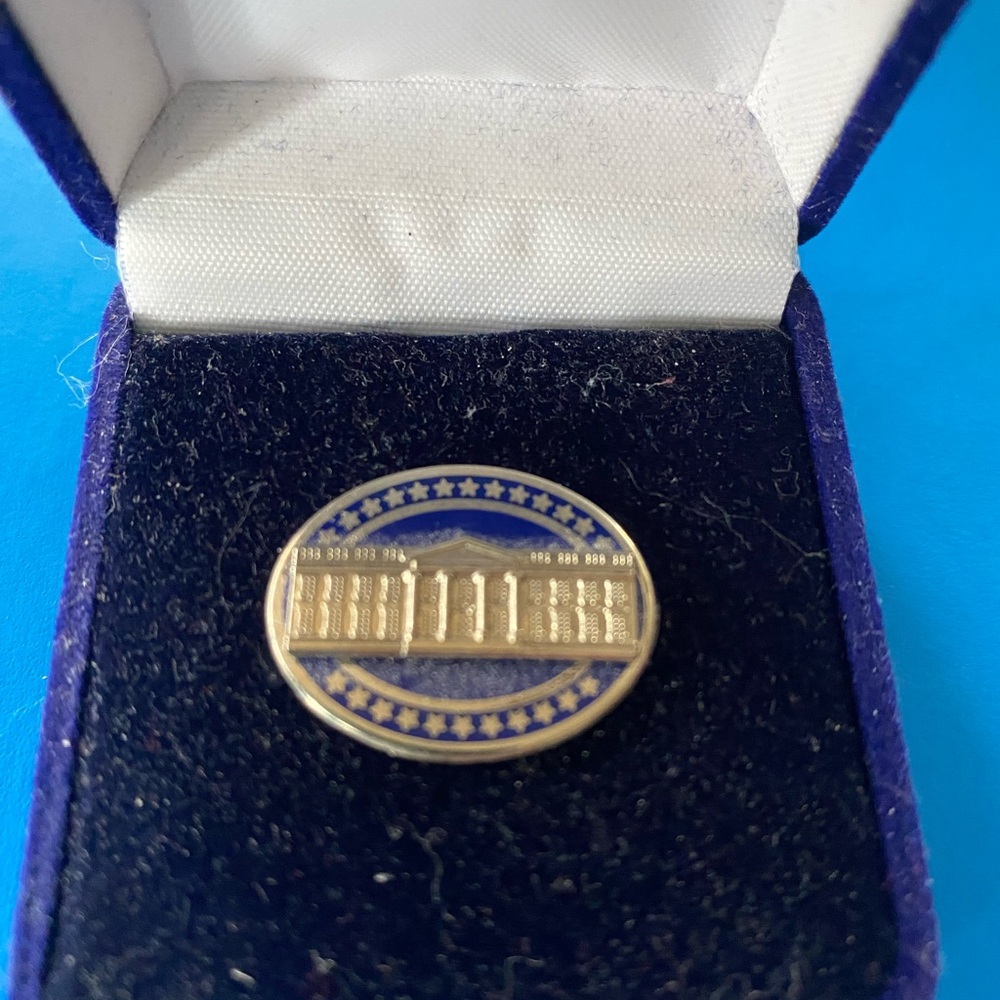 Silver and blue White House lapel pin